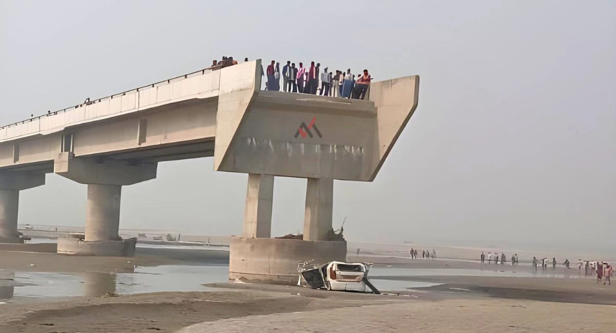 Car fallen on riverbed after plunging off an incomplete bridge on the Bareilly-Badaun road.