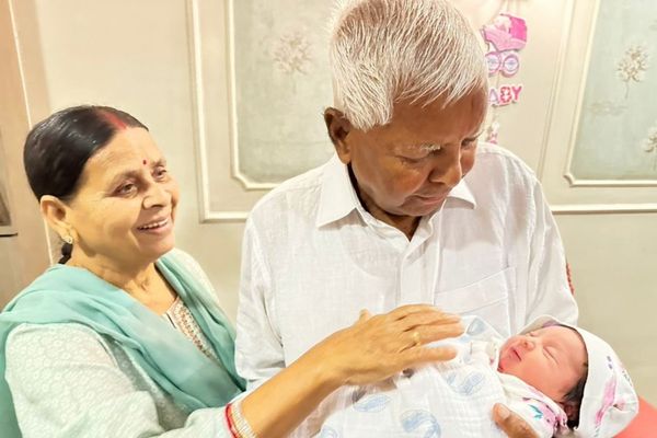 Lalu Prasad Yadav was seen feeding his granddaughter on his lap