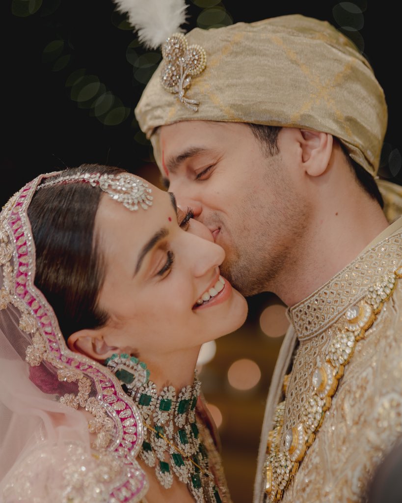 Sidharth Malhotra 
and 
Kiara Advani shared his Kissing scene on social media after marriage